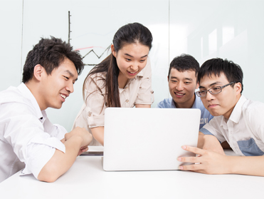 Office scene of management personnel collaborating